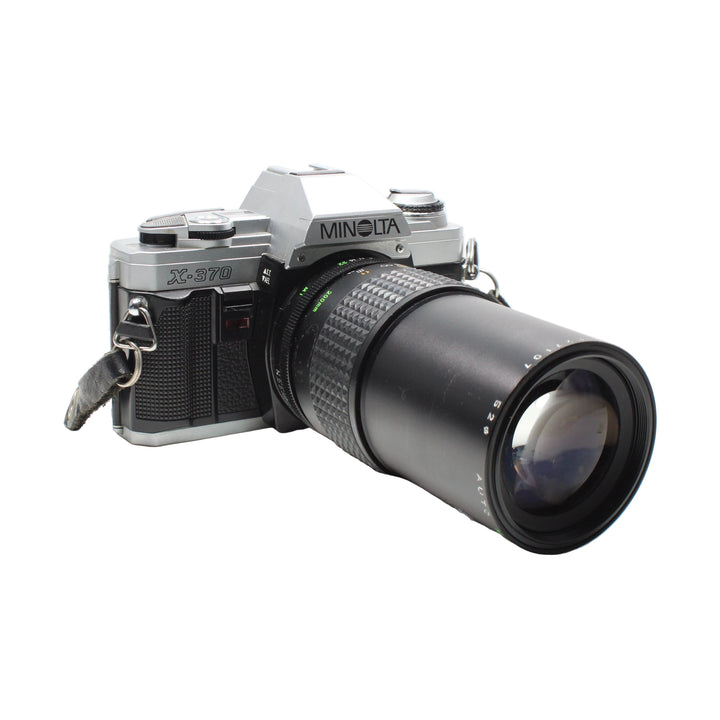 Minolta X-370 200mm f/2.8 zoom lens side view with A/F switch at ClubCamera.com