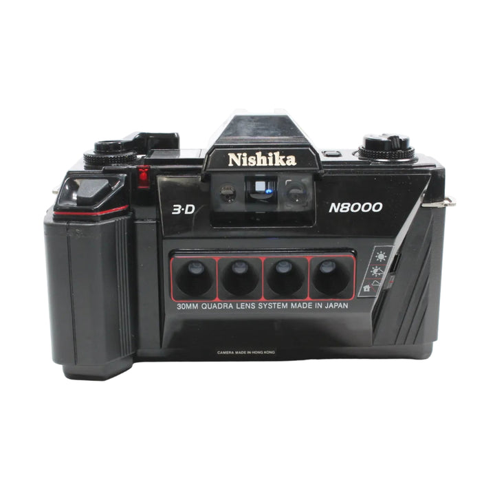Front of black Nishika N8000 quad-lens 3D film camera with gold logo and red lens frame at ClubCamera.com
