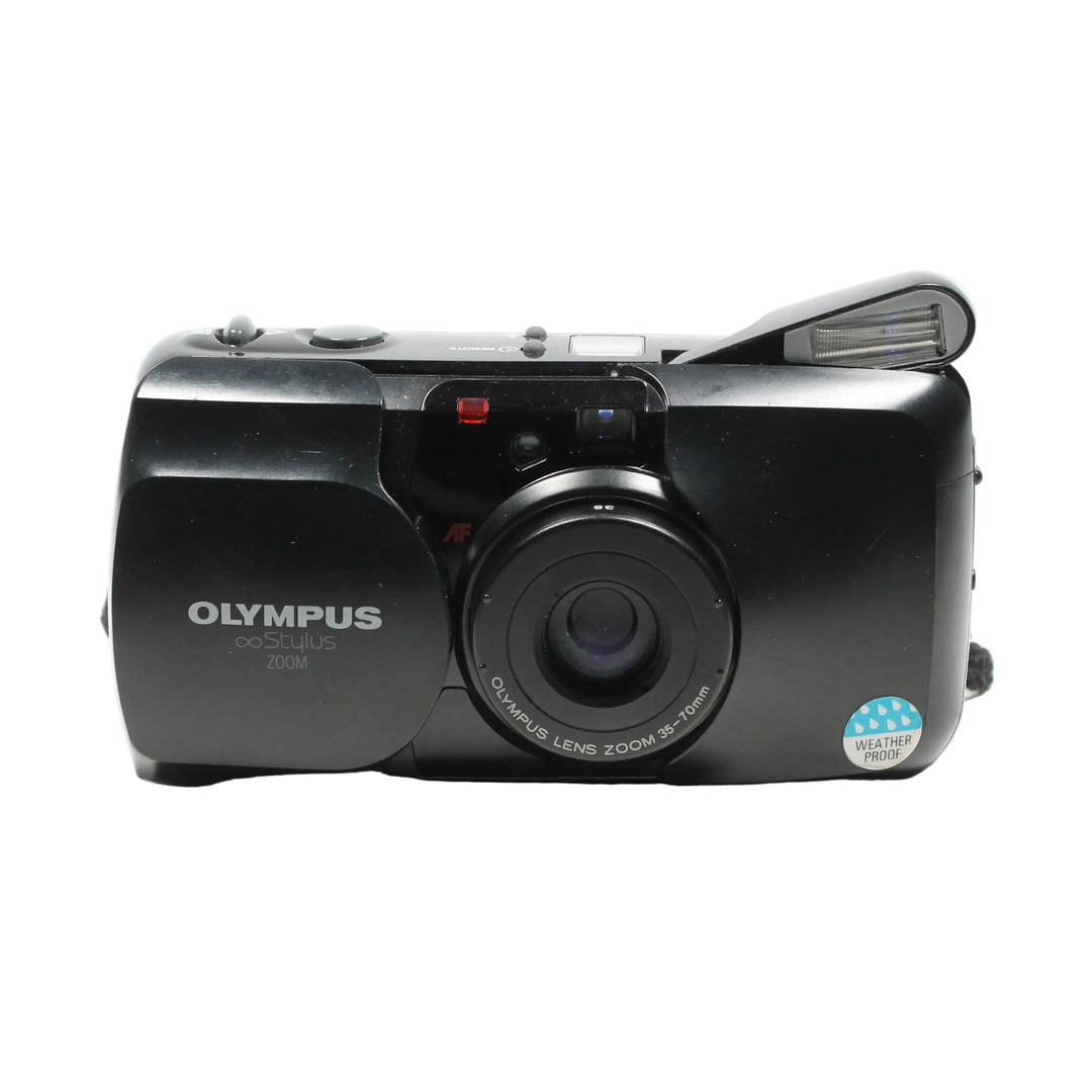 ClubCamera.com front shot of black Olympus Infinity Stylus Zoom 35-70mm film camera with extended flash and weatherproof raindrop sticker