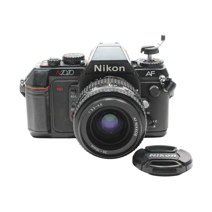 Front profile of Nikon N2020 35mm film camera with purple coated lens glass available at ClubCamera.com
