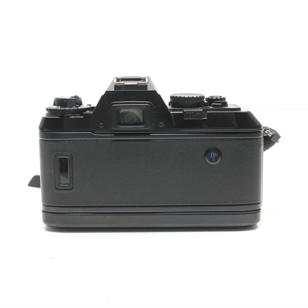 Rear view of vintage Nikon N2020 35mm SLR film camera with blue eyepiece sold by ClubCamera.com