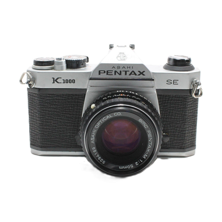 Pentax K1000 SE Black 35mm SLR film camera with SMC Pentax-M 50mm lens by ClubCamera.com