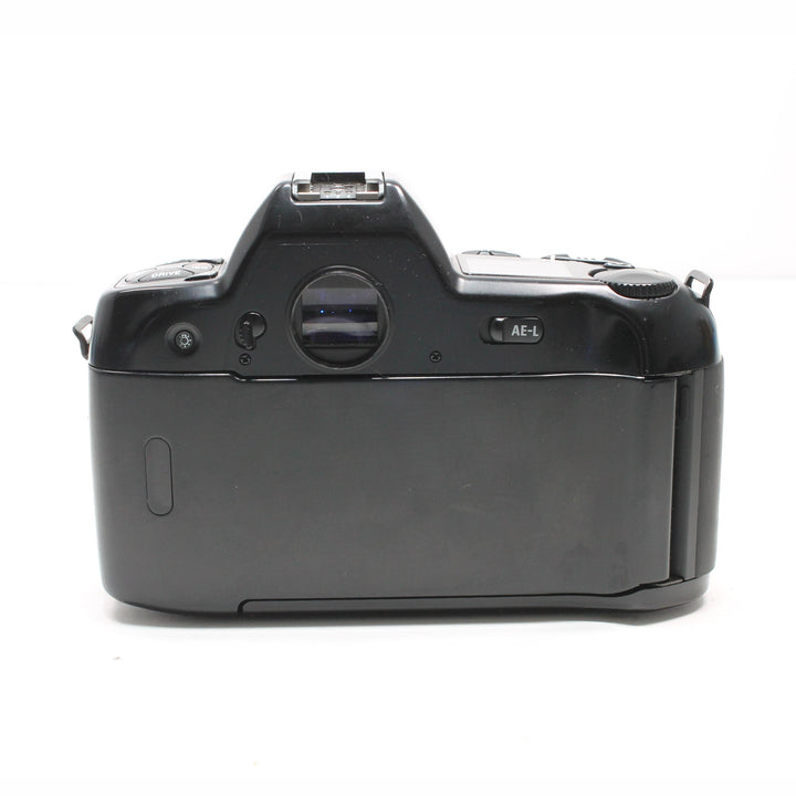 Rear view of Nikon N90 SLR film camera body highlighting AE-L label and ergonomic eyepiece design at ClubCamera