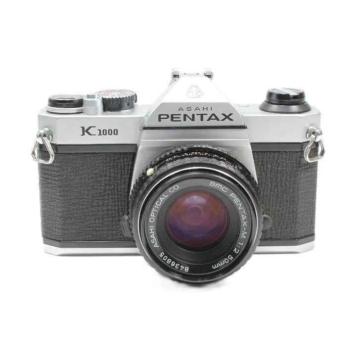 ClubCamera.com Pentax K1000 silver 35mm SLR film camera kit with SMC Pentax-M 50mm f/2 lens and textured grip