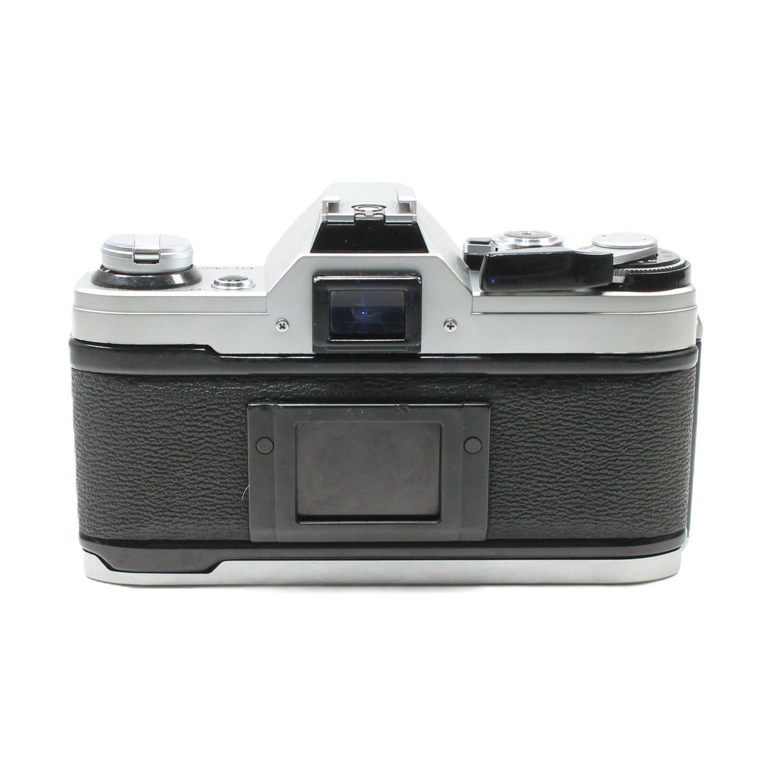 Canon AE-1 35mm SLR film camera rear view with textured grip and shutter dial at ClubCamera.com