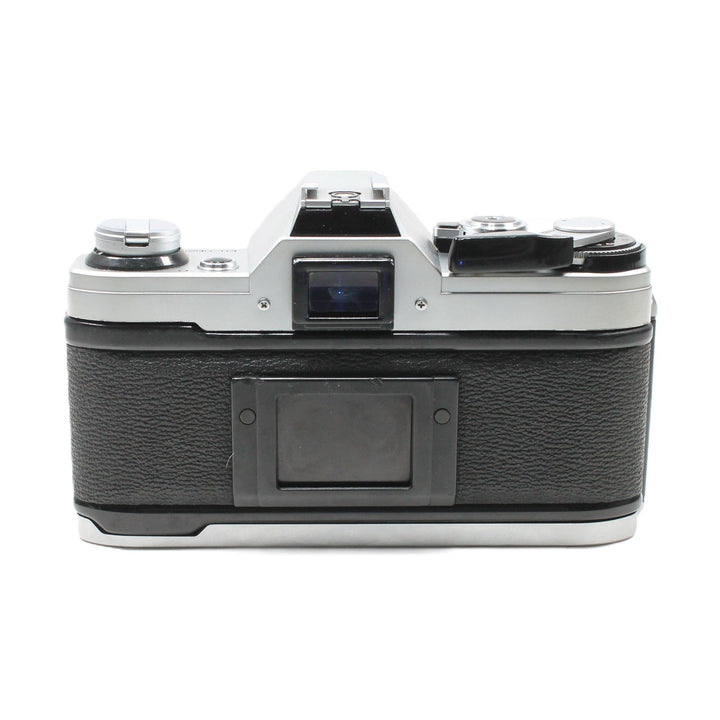 Canon AE-1 35mm SLR film camera rear view with textured grip and shutter dial at ClubCamera.com