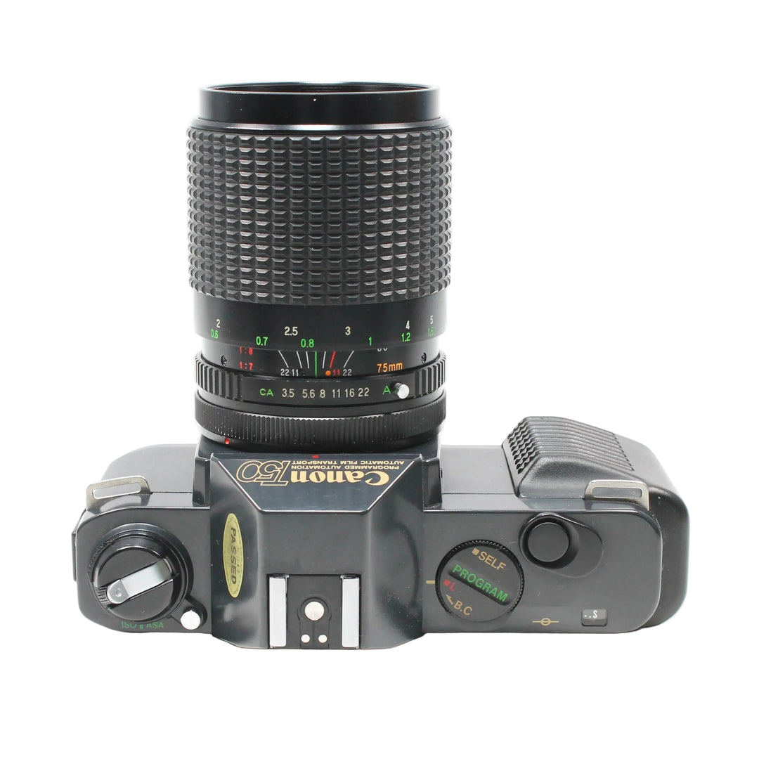 Top view of Canon T50 35mm SLR showing PROGRAM AE dial and 75mm zoom lens