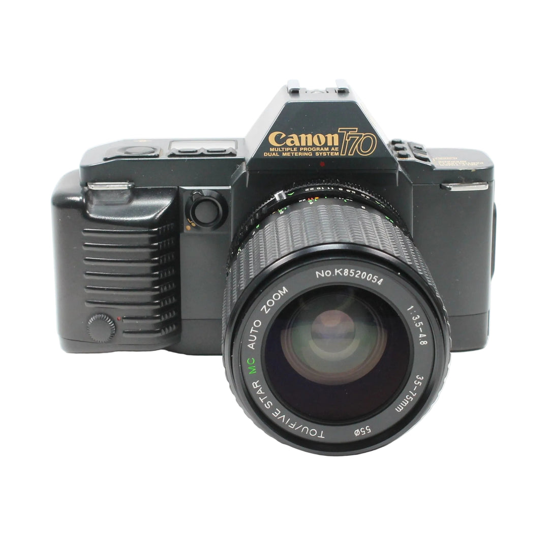 Front profile of black Canon T70 SLR film camera with 35-70mm auto zoom lens from ClubCamera.com