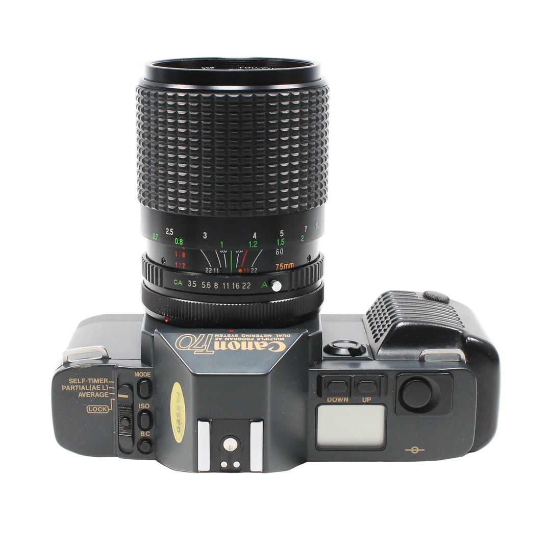 Top view of Canon T70 35mm SLR showing Dual Metering System and LCD screen at ClubCamera.com