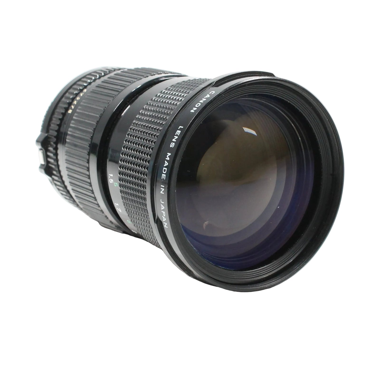 Canon FD 35-105mm f/3.5 lens side view showing blue anti-reflective coating and MADE IN JAPAN engraving