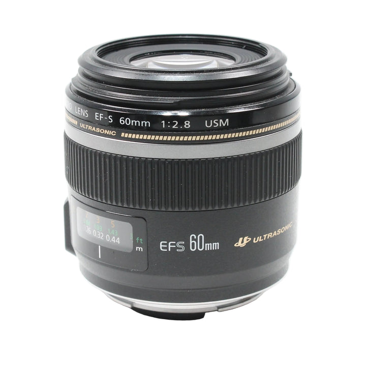ClubCamera.com Canon EF-S 60mm f/2.8 Macro USM lens front view with engraved text and gold ultrasonic stripe