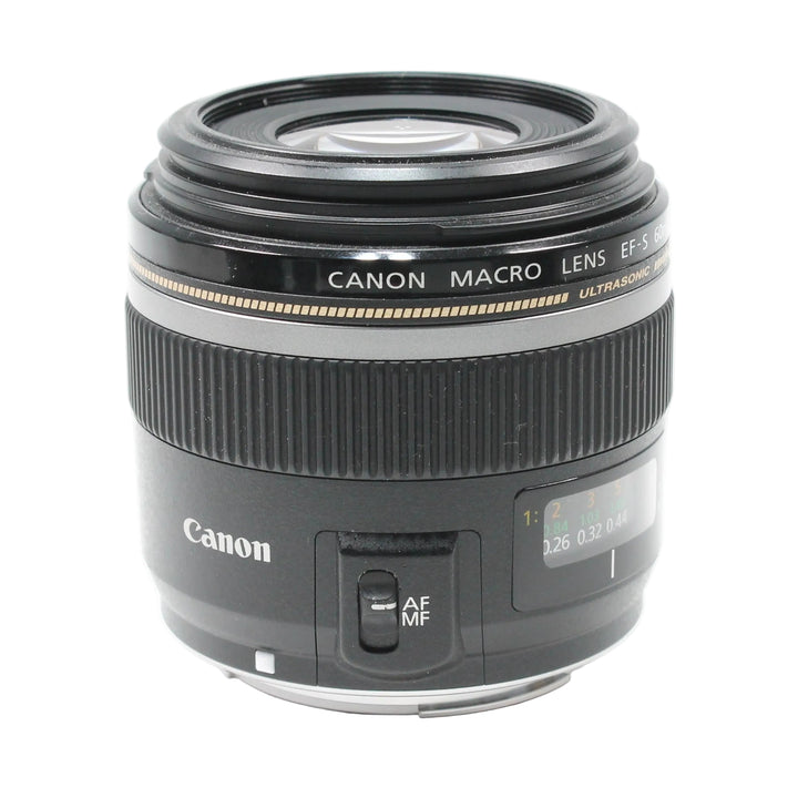 ClubCamera.com Canon EF-S 60mm f/2.8 Macro USM lens front shot with AF/MF switch and distance scale window