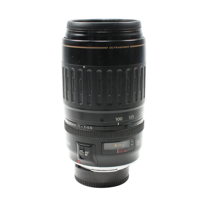 ClubCamera.com Canon EF 100-300mm f/4.5-5.6 USM lens upright view highlighting control panel and white focal length markers