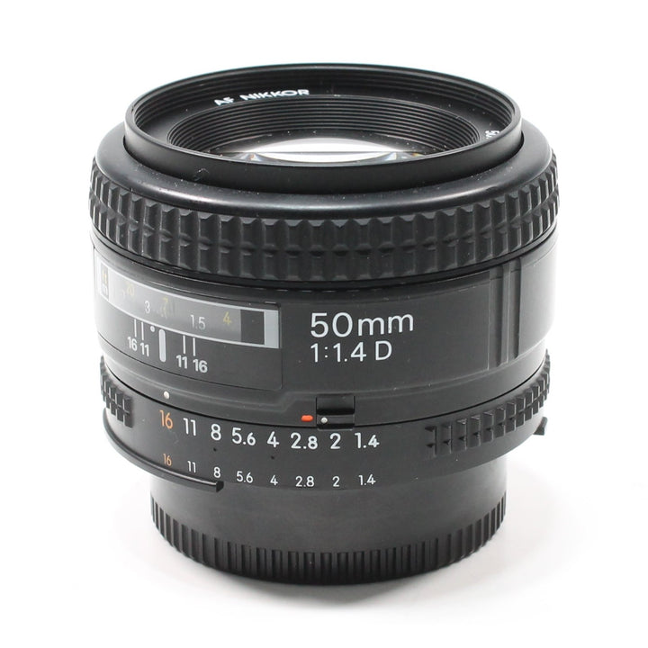 Nikon AF Nikkor 50mm f/1.4D prime lens with textured focus ring and white orange markings by ClubCamera.com