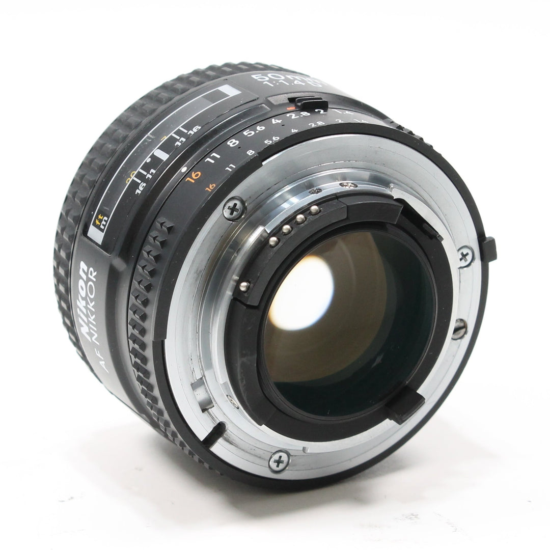 Rear view of Nikon AF Nikkor 50mm f/1.4D F-mount bayonet with silver contacts and FX label by ClubCamera.com