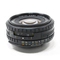 ClubCamera.com Nikon Nikkor 50mm f/1.8 Series E lens side profile with orange distance scale and yellow aperture markings