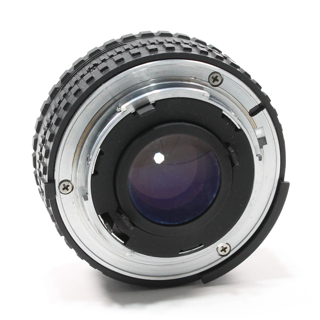 ClubCamera.com Nikon Nikkor 50mm f/1.8 manual focus lens rear F-mount bayonet with silver screws and purple-blue coating