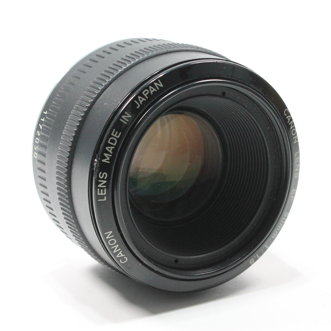 ClubCamera.com Canon EF 50mm f/1.8 side angle showing Made in Japan engraving and matte black finish