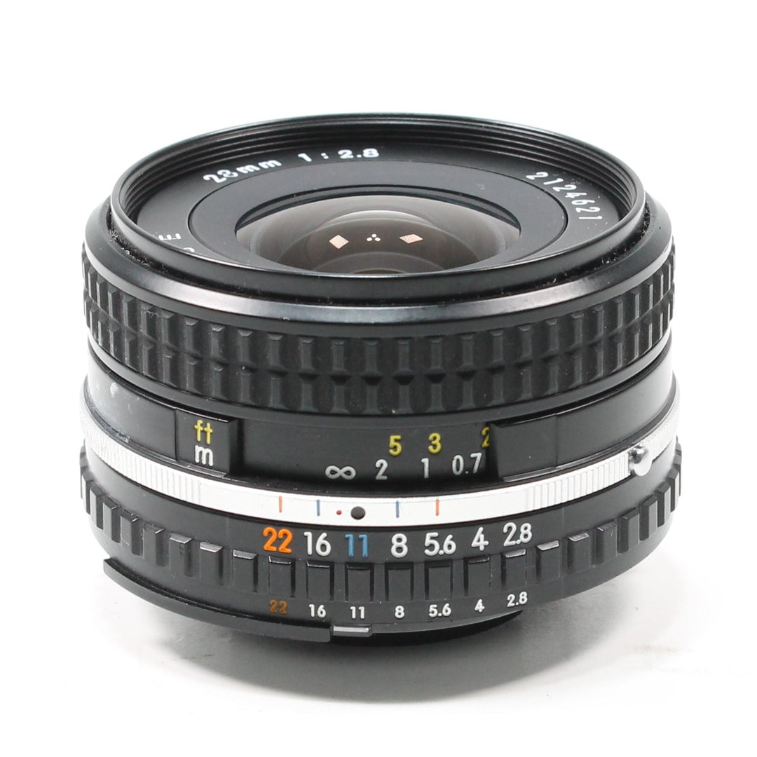Nikon 28mm f/2.8 AI-S manual focus lens at ClubCamera.com showing engraved aperture scale and textured black focus ring