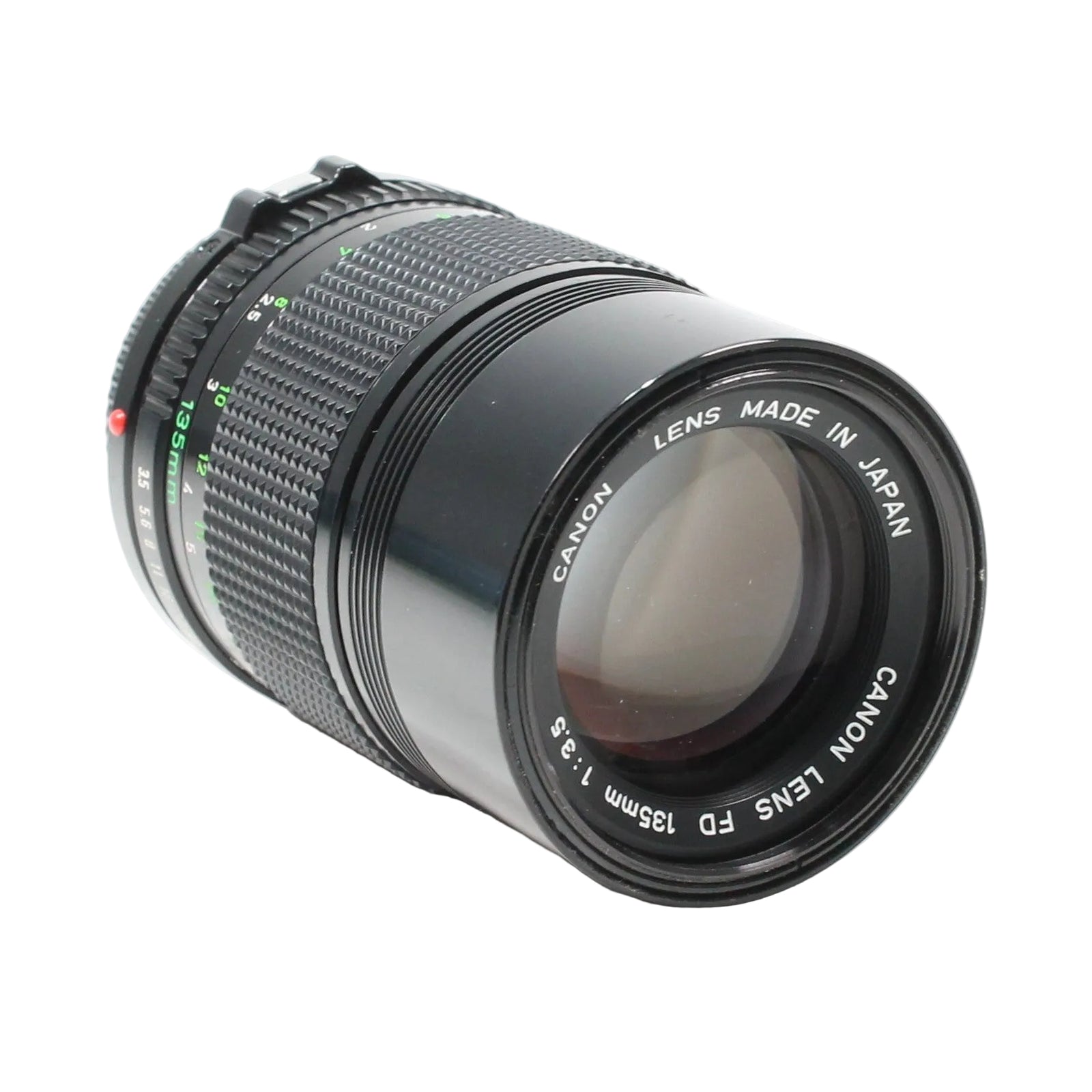 ClubCamera.com Canon FD 135mm f/3.5 vintage prime lens three-quarter view displaying CANON LENS FD 135mm 1:3.5 rim text and red alignment dot