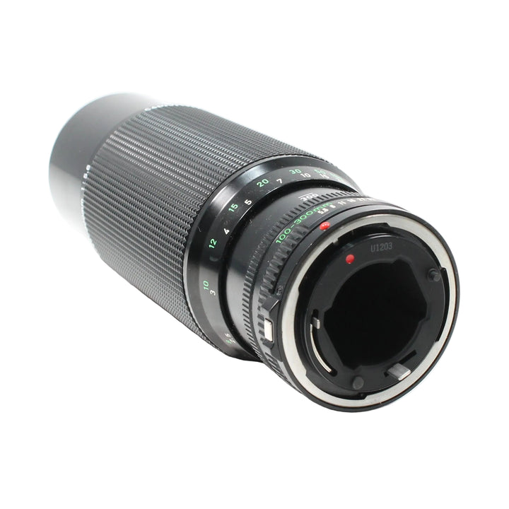 Close-up rear bayonet mount of Canon FD 100-300mm f/5.6 manual focus lens at ClubCamera.com