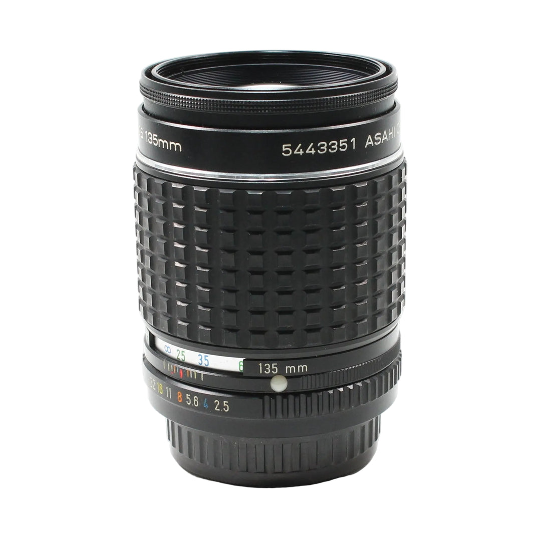 Front view of Pentax 135mm f/2.8 telephoto prime lens with depth-of-field scale at ClubCamera.com