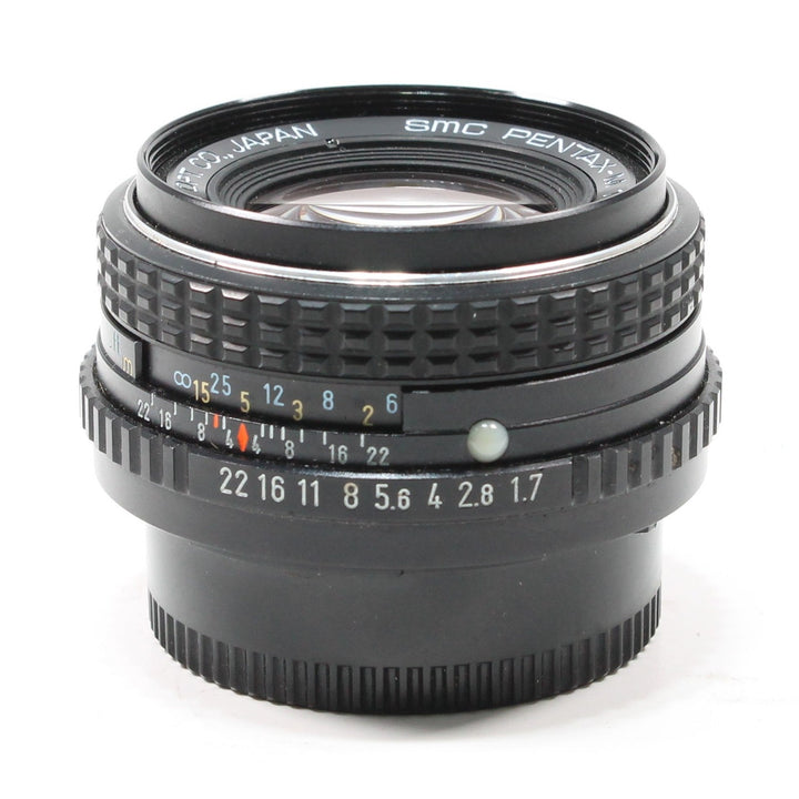 Pentax SMC 50mm f/1.7 manual focus lens by ClubCamera showing engraved aperture ring and ribbed grip texture