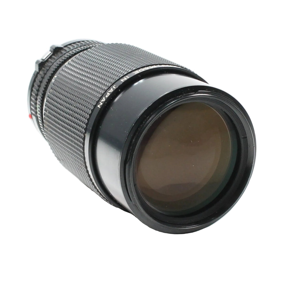 ClubCamera.com Canon FD 50-135mm f/3.5 manual focus zoom lens side profile with knurled grip ring