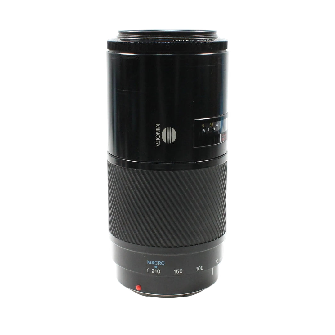 ClubCamera.com Minolta telephoto lens front view showing logo and macro focus markings