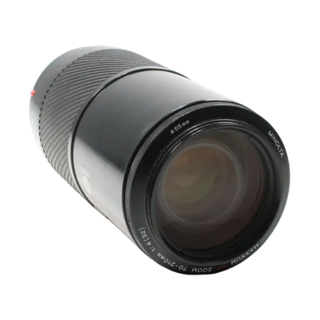 ClubCamera.com Minolta Maxxum zoom lens front element with silver mount ring