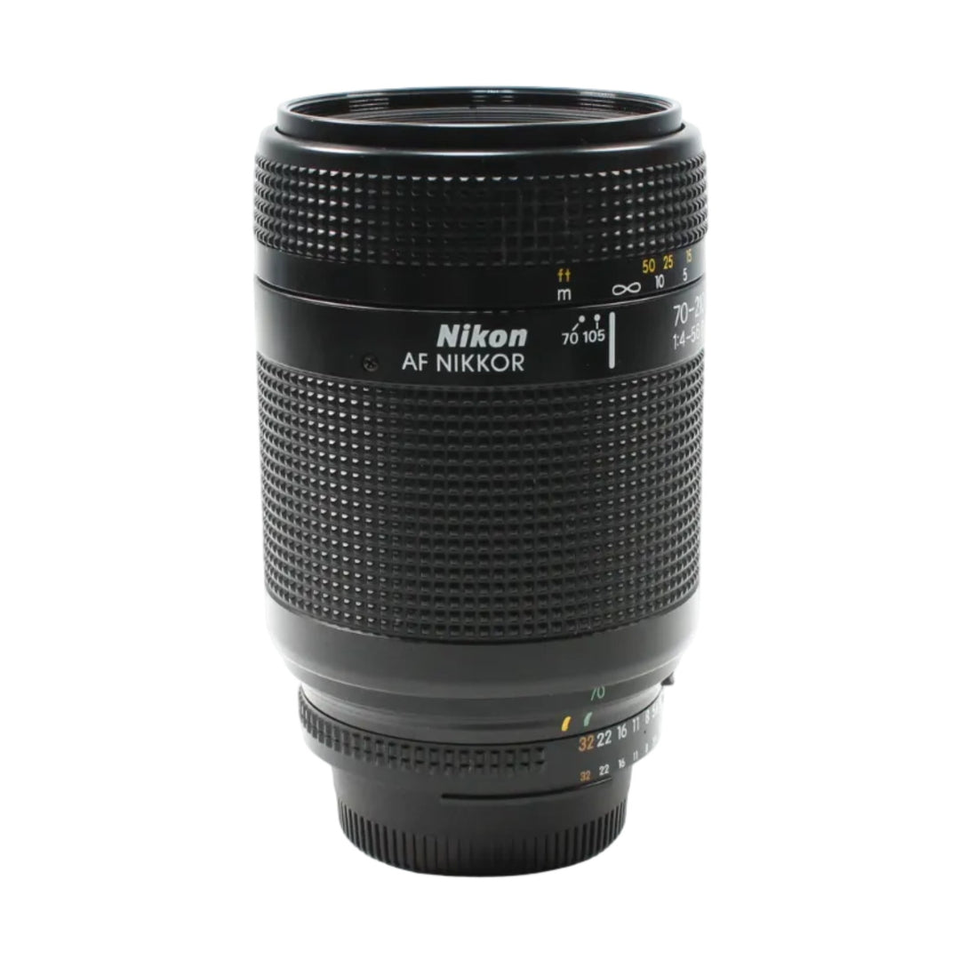 Black Nikon AF Nikkor 70-210mm f/4-5.6D lens front view showing engraved specs and diamond grip pattern at ClubCamera.com