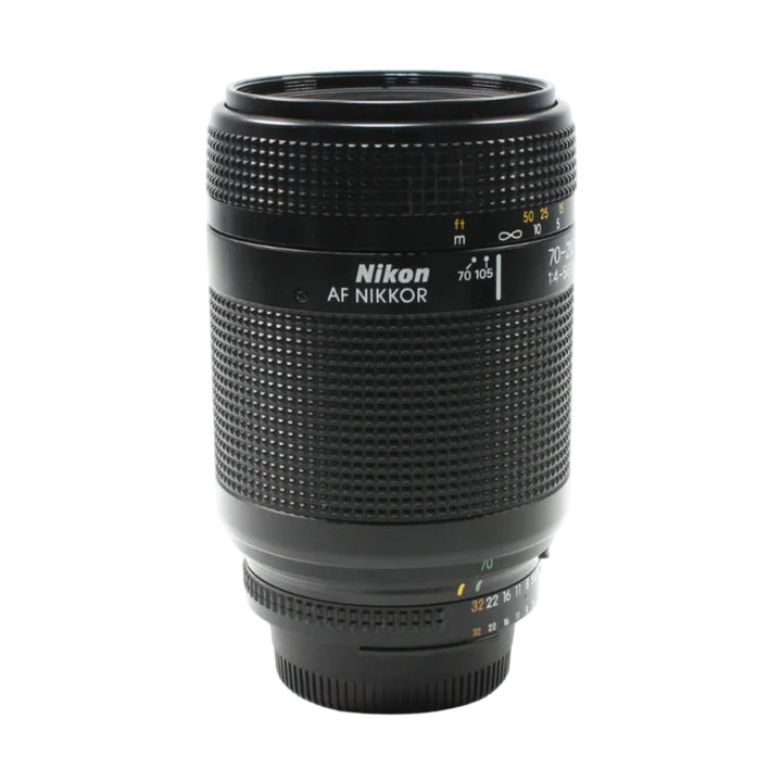 Black Nikon AF Nikkor 70-210mm f/4-5.6D lens front view showing engraved specs and diamond grip pattern at ClubCamera.com
