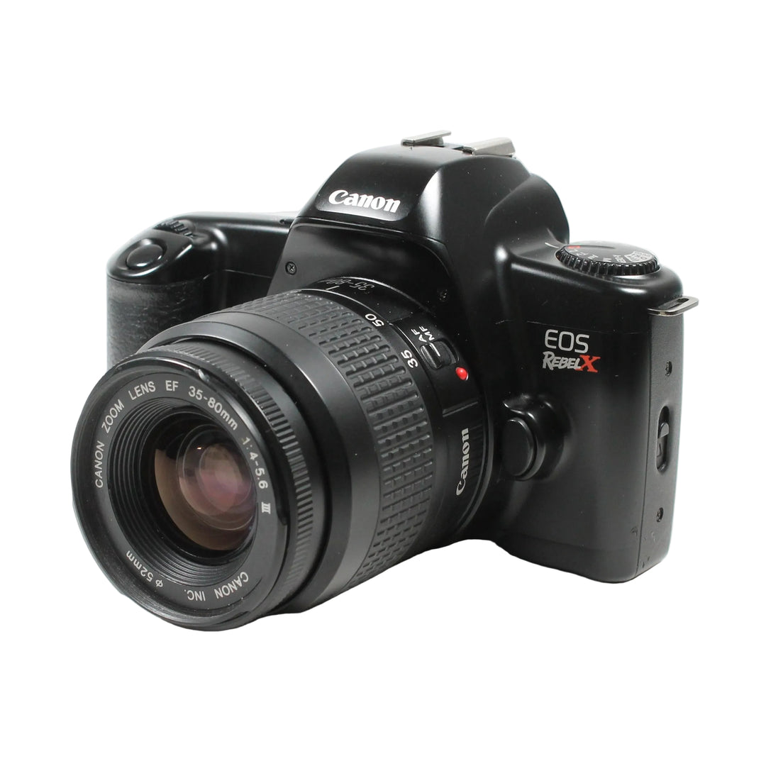 Canon EOS Rebel X 35mm SLR with red branding and shutter dial view from ClubCamera.com