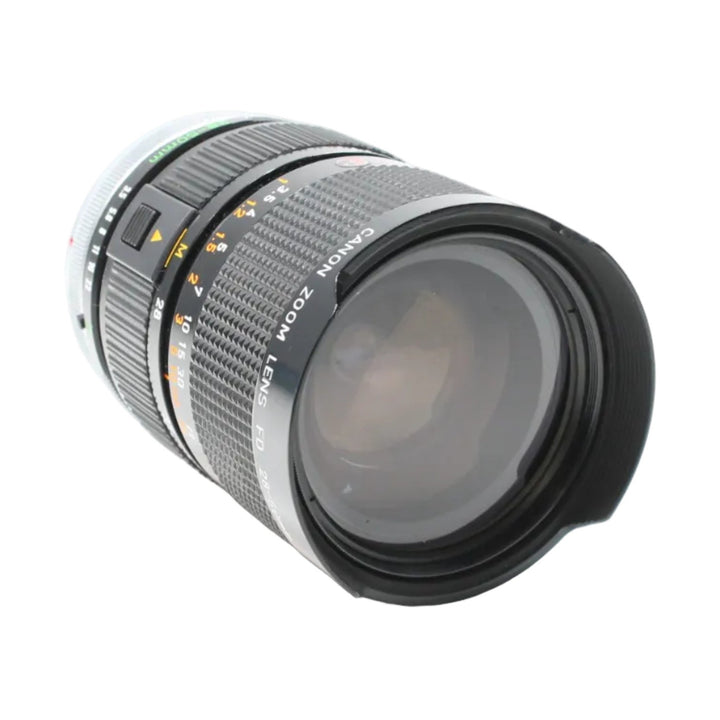 Canon FD 28-50mm f/3.5 lens with petal hood and orange aperture scale at ClubCamera.com