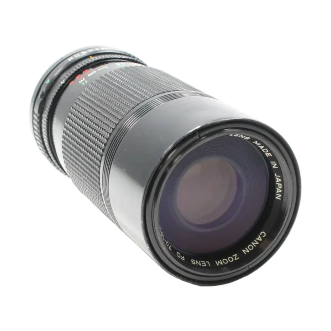 Canon FD 70-150mm f/4.5 lens front element with purple coating and Made in Japan text by ClubCamera.com