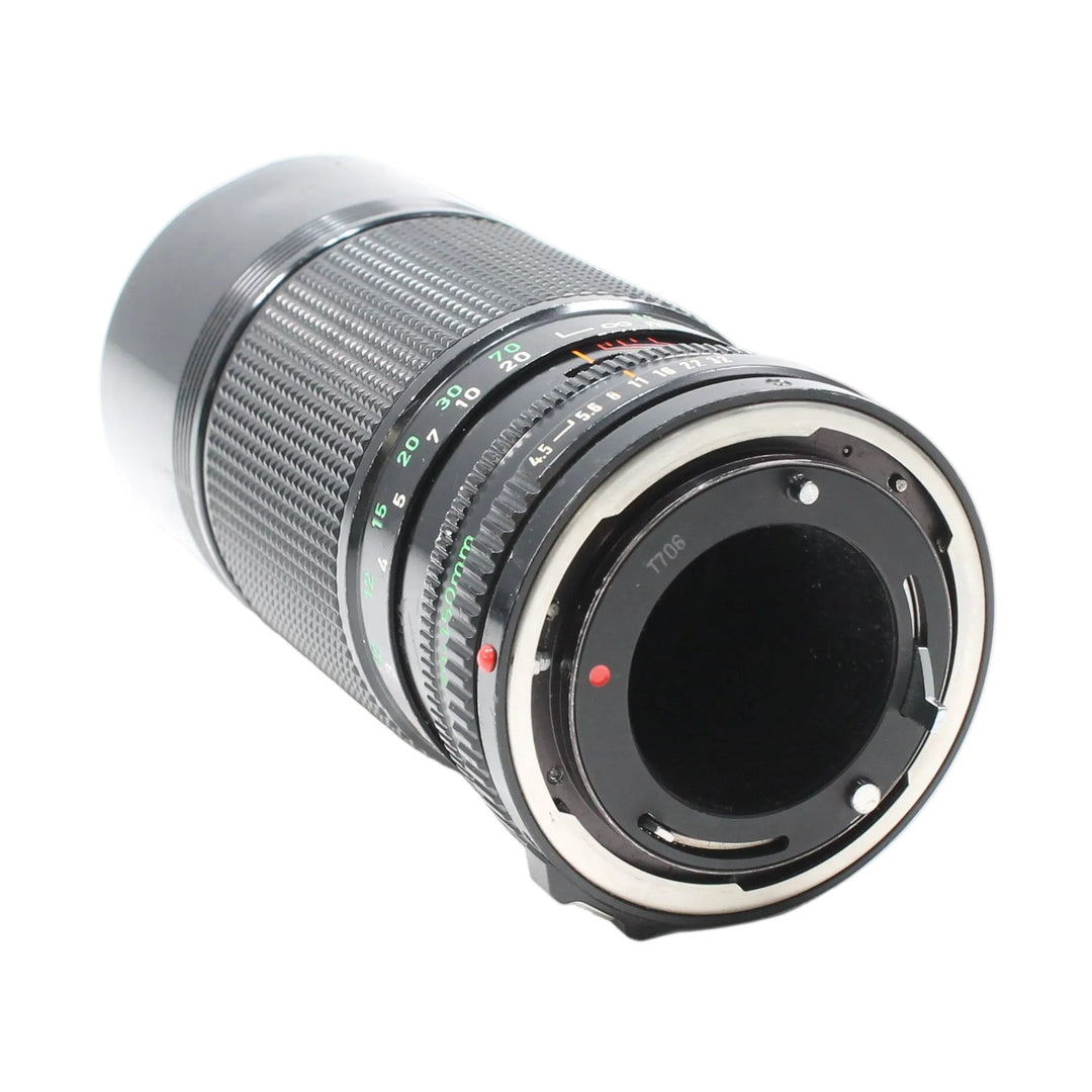 Canon FD mount interface on 70-150mm f/4.5 manual focus lens showing metal contacts and gasket ring by ClubCamera.com