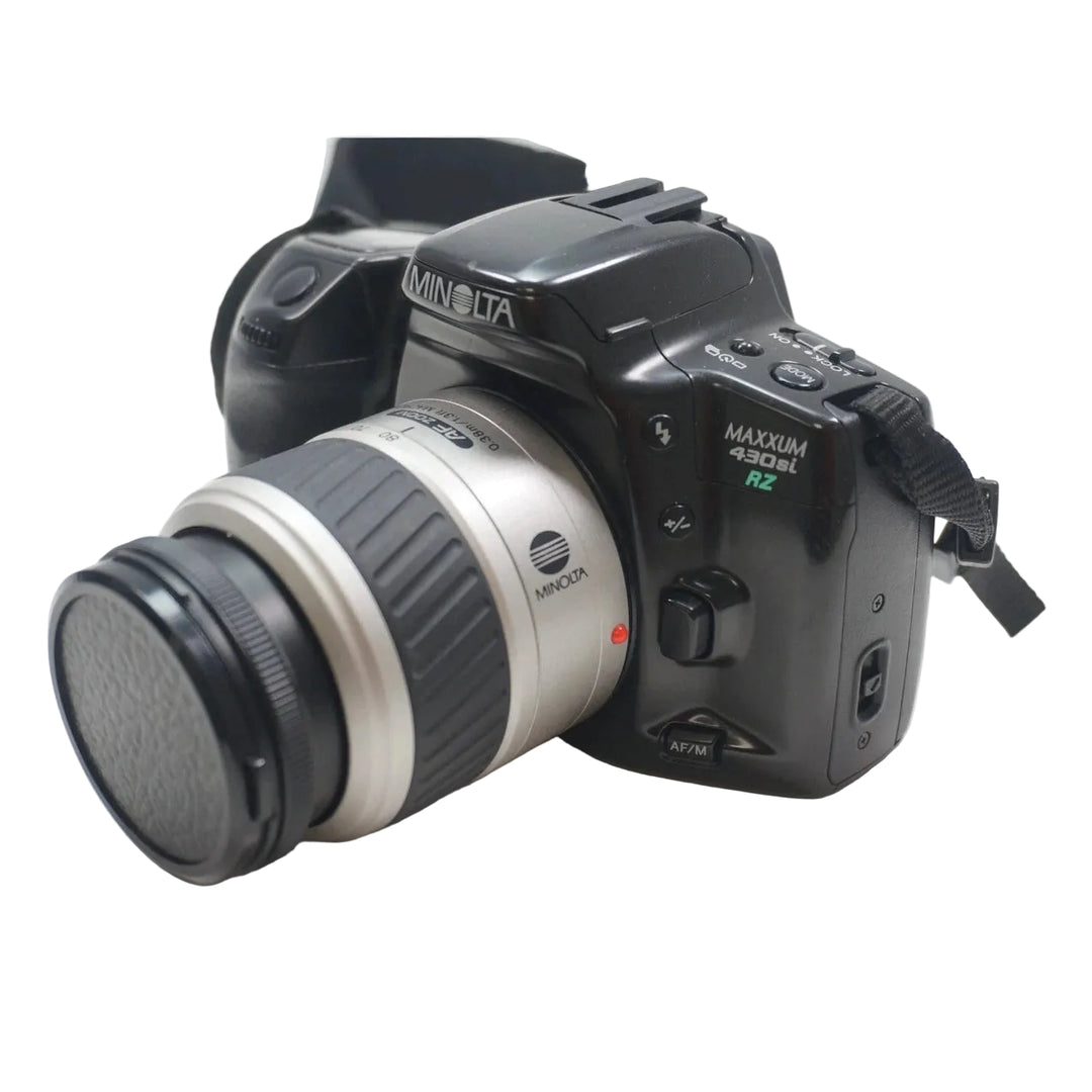 ClubCamera.com Minolta Maxxum 430si black SLR film camera with silver AF zoom lens and raised flash