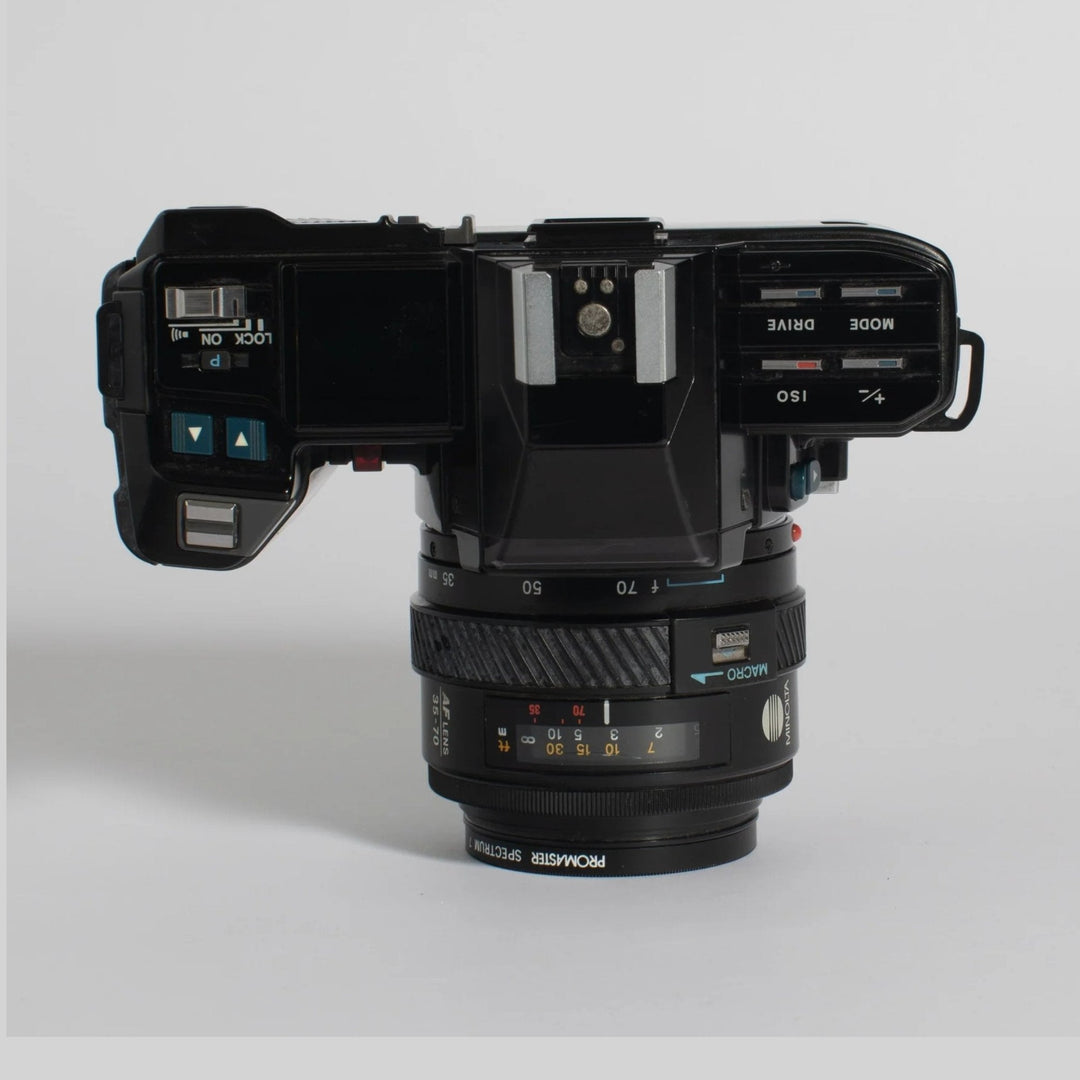 Top control panel of Minolta 7000 autofocus SLR with Maxxum zoom lens dials at ClubCamera.com