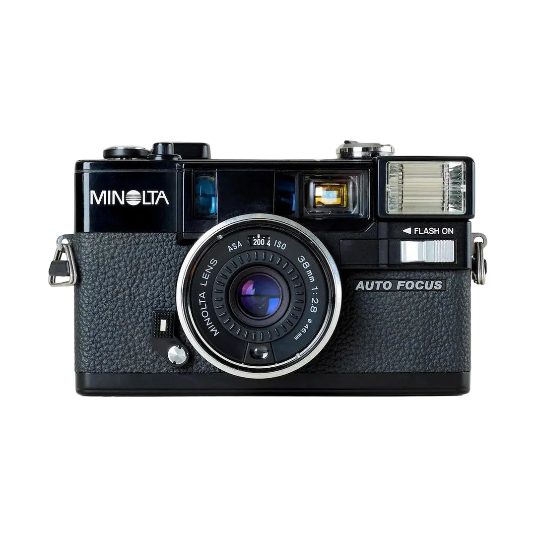 Front view of black Minolta AF2 compact camera with 38mm f/2.8 lens and integrated flash by ClubCamera.com