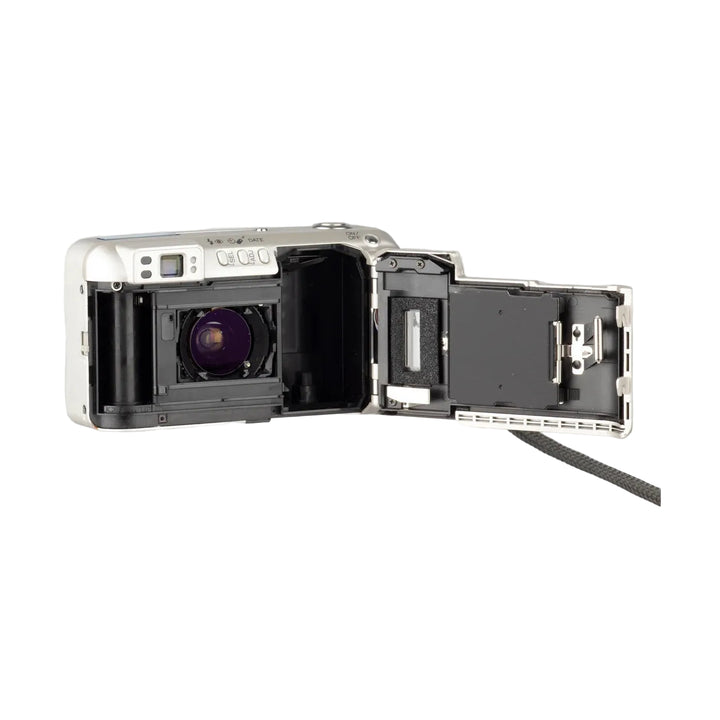 ClubCamera.com open film compartment of silver Minolta Freedom Zoom 140 revealing internal mechanics and date function