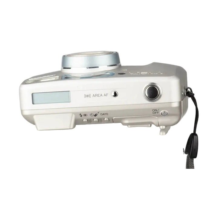 ClubCamera.com top view of silver Minolta Freedom Zoom 140 showing mode dial LCD screen and power button