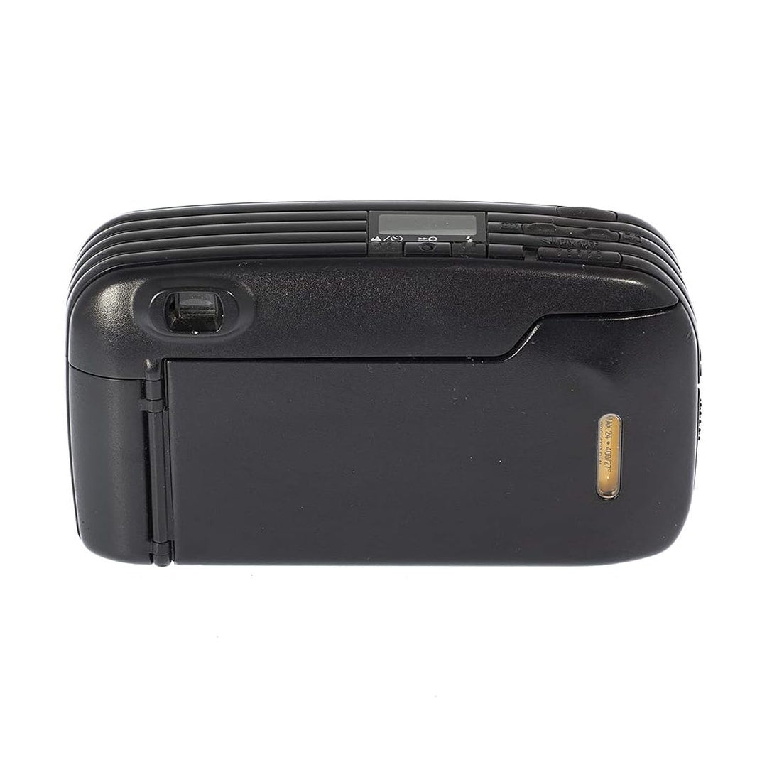 Back panel of black Nikon ZoomTouch 470 AF film camera featuring hinged battery cover and yellow serial label from ClubCamera.com