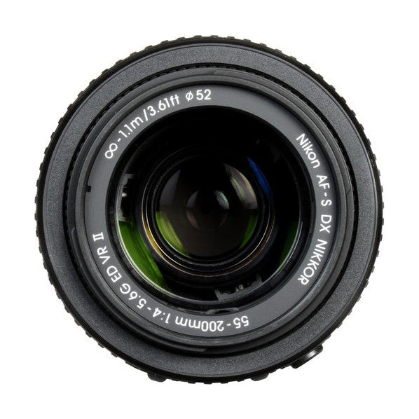 Top-down close-up of engraved Nikon 55-200mm f/4-5.6G ED VR II specs at ClubCamera