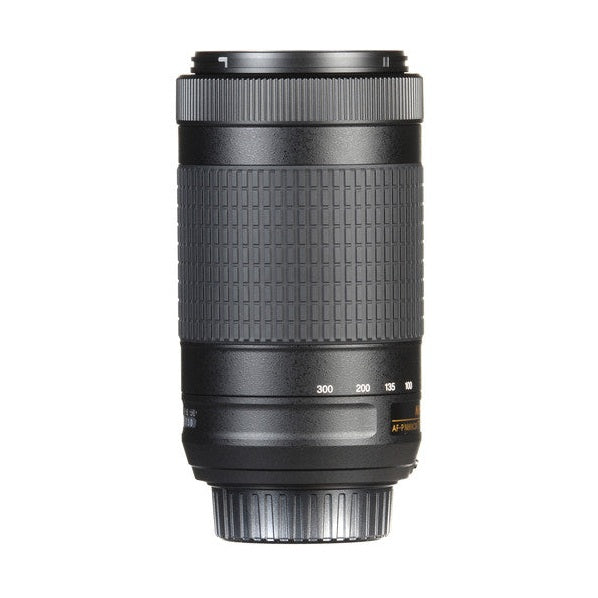 Angled shot of slim portable Nikon 70-300mm DX lens showing focal scale and matte finish at ClubCamera.com