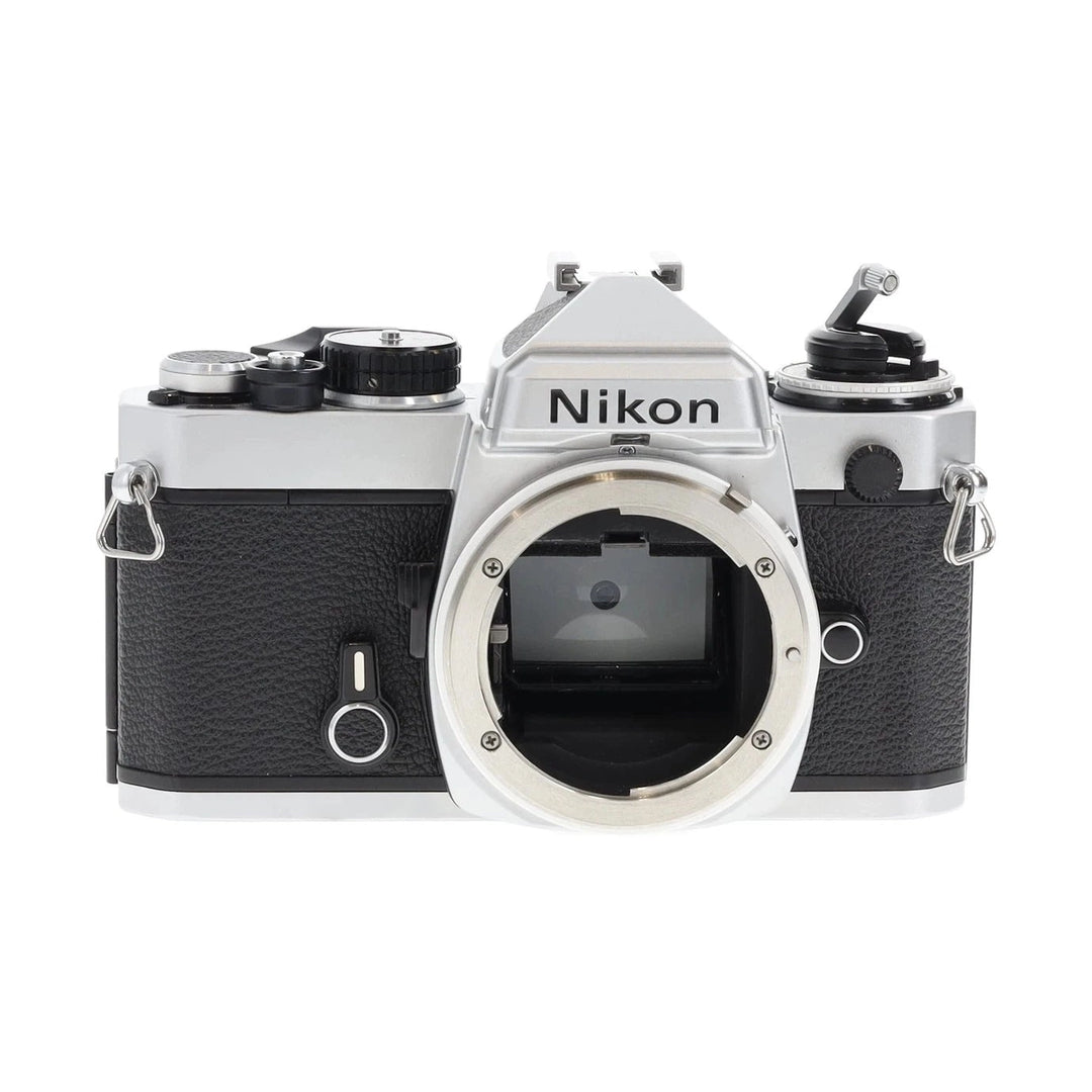 Front view Nikon FE 35mm film camera body only by ClubCamera displaying embossed logo and open F-mount bayonet