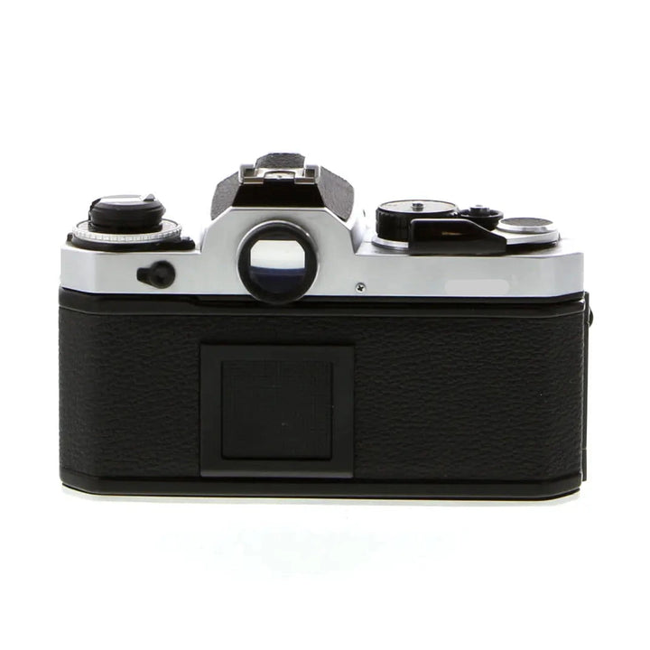 Top view Nikon FE SLR camera body by ClubCamera showing silver top plate dials and black textured back panel
