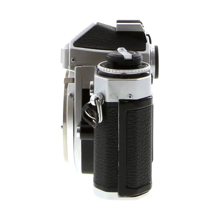 Nikon FE silver film camera body by ClubCamera side profile with black leatherette grip and exposed F-mount