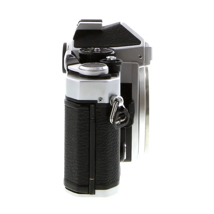 Right angle Nikon FE manual focus SLR body by ClubCamera highlighting shutter speed dial and ergonomic handgrip