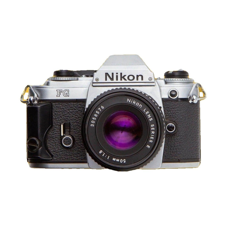 ClubCamera front shot of silver Nikon FG 35mm film SLR camera kit with 50mm f/1.8 Nikkor lens featuring purple anti-reflective coating