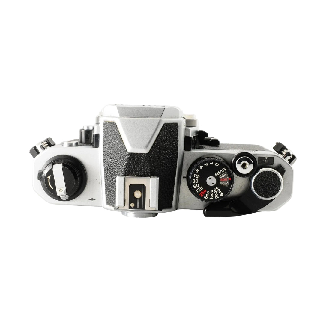 Nikon FM2 silver and black SLR film camera kit with textured grip and shutter speed dial at ClubCamera.com